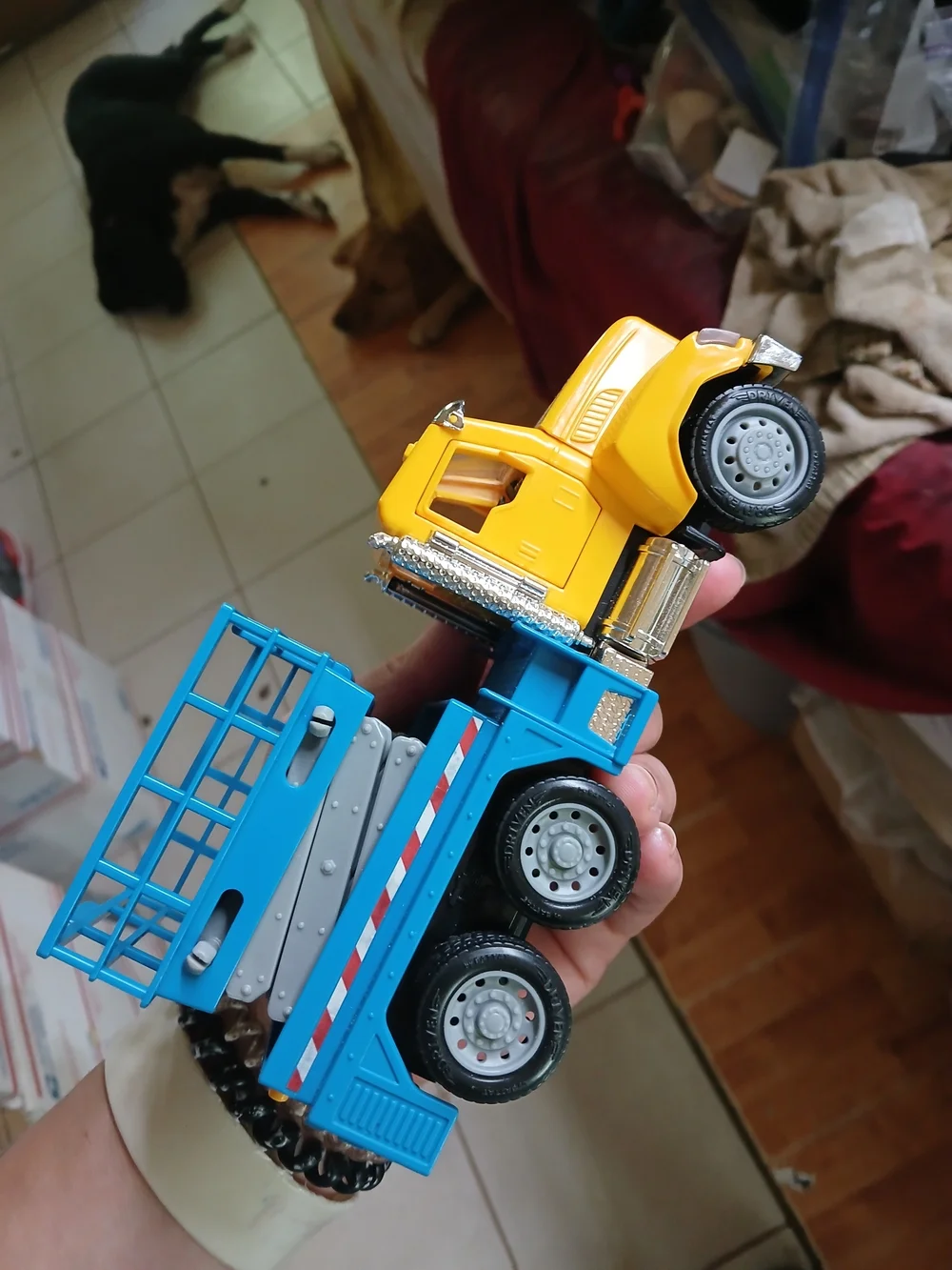 toy is a Driven by Battat Micro Series Scissor Lift Truck.